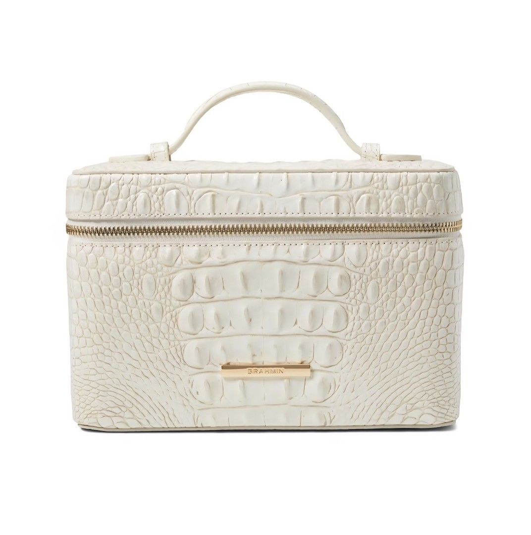 Brahmin Cosmetic Bag (Category: Luxury Bags & Wallets) located in Quezon City. Submitted by dymc25 (Listing ID 1395106000, Image 2). Description: Brand New Original Product details Brahmin's Charmaine is a must-have travel makeup bag. This structured train case offers plenty of space for your cosmetics and toiletries. Use the interior elastic pocket to keep brushes and other items in place. A wide zip-around opening makes it easy to retrieve make