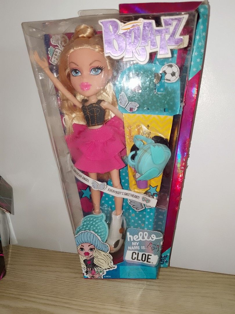 Bratz Cloe Doll (Category: Kids Toys) located in Manila. Submitted by lala_tan (Listing ID 1395154723, Image 1). Description: - Bratz Cloe doll - Original packaging - Blonde hair - Pink skirt and black top - Includes accessories - Comes with a blue bag - Packaging features Bratz logo - Packaging reads "Cloe".