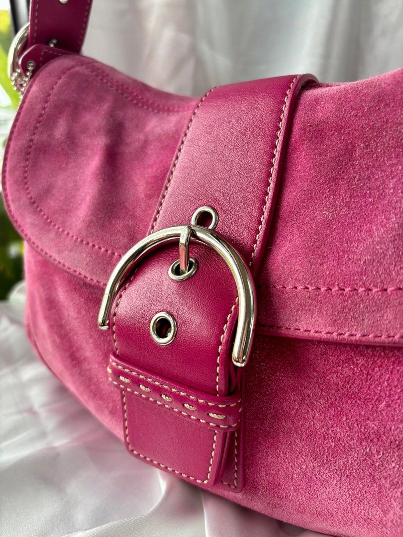 Coach Soho in Pink Suede (Category: Luxury Bags & Wallets) located in Calamba. Submitted by chrysanthemums.mnl (Listing ID 1395075641, Image 2). Description: Coach Soho in Pink Suede ₱ 14,000 or best offer In Excellent Condition: rank A Clean Interior and Exterior. Exterior can still be improved with the help of bag spa No Stains No Foul Odor No Rubs or Holes No Cracks and Chipping No Major Flaws Affecting Functionality One external back pocket w