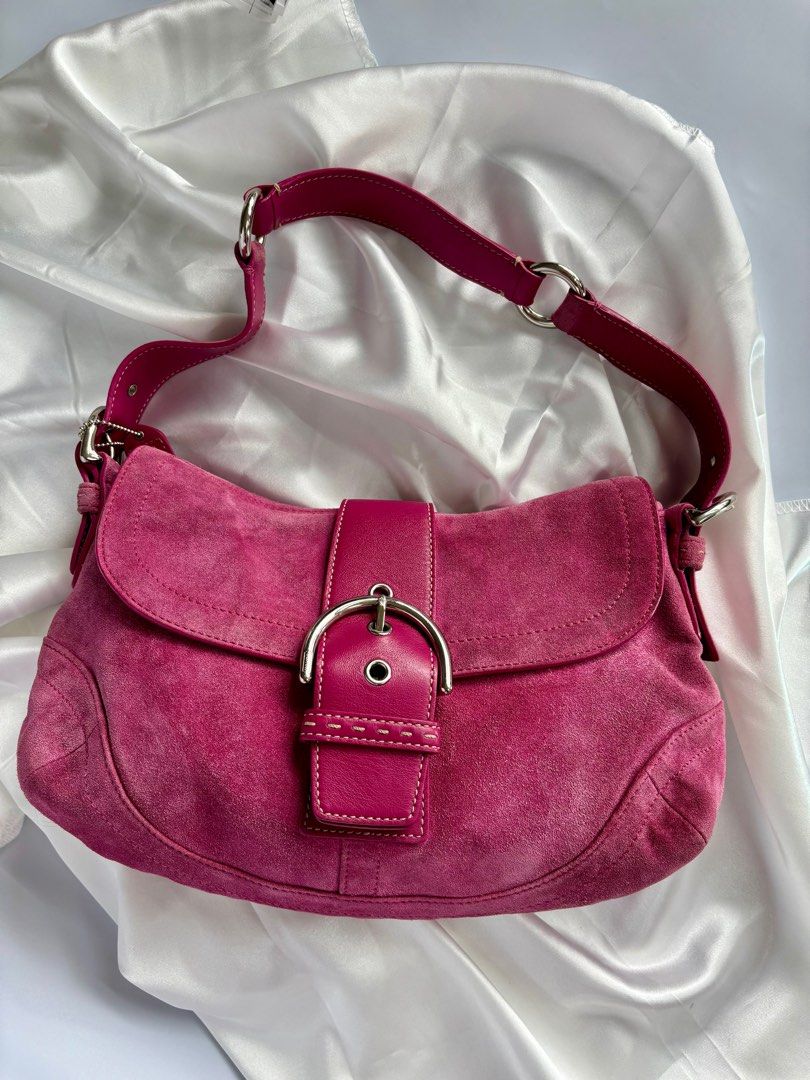 Coach Soho in Pink Suede (Category: Luxury Bags & Wallets) located in Calamba. Submitted by chrysanthemums.mnl (Listing ID 1395075641, Image 1). Description: Coach Soho in Pink Suede ₱ 14,000 or best offer In Excellent Condition: rank A Clean Interior and Exterior. Exterior can still be improved with the help of bag spa No Stains No Foul Odor No Rubs or Holes No Cracks and Chipping No Major Flaws Affecting Functionality One external back pocket w