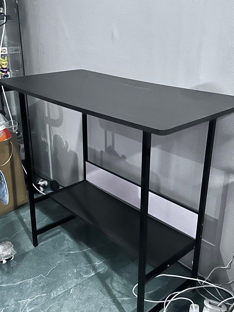 Desktop / Office Table (Category: Office Furniture & Fixtures) located in Manila. Submitted by giagiagia19 (Listing ID 1395029503, Image 1). Description: Made of light weight wood. Roughly 80cm x 40cm x 70cm. Used for 4 years (patungan lang books), manage your expectations. RFS: no use; bought a glass desktop table. Assembled already for pick up @manila. .