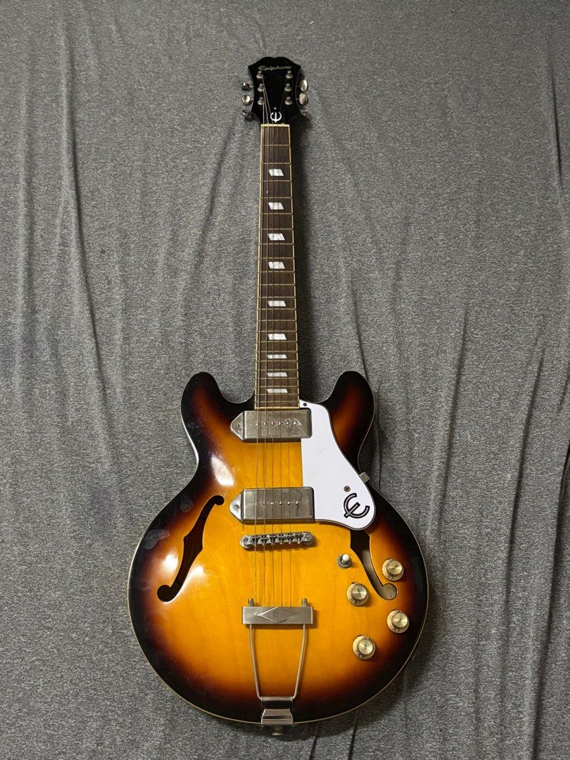Epiphone Casino Coupe VS (Category: Musical Instruments) located in Bacoor. Submitted by diannaaaaa (Listing ID 1395072739, Image 1). Description: Electric Guitar · Color/ Finish: Vintage Sunburst · Technology: Hollow Body · Body Shape: ES Shape · Strings: 6 string · Neck construction: Set in neck · Frets: 22 · Scale Length: 24,75” (629 mm) · Body Material: Maple laminated · Top: Maple veneer RFS: Loss of interest :( For faster transaction, kindl
