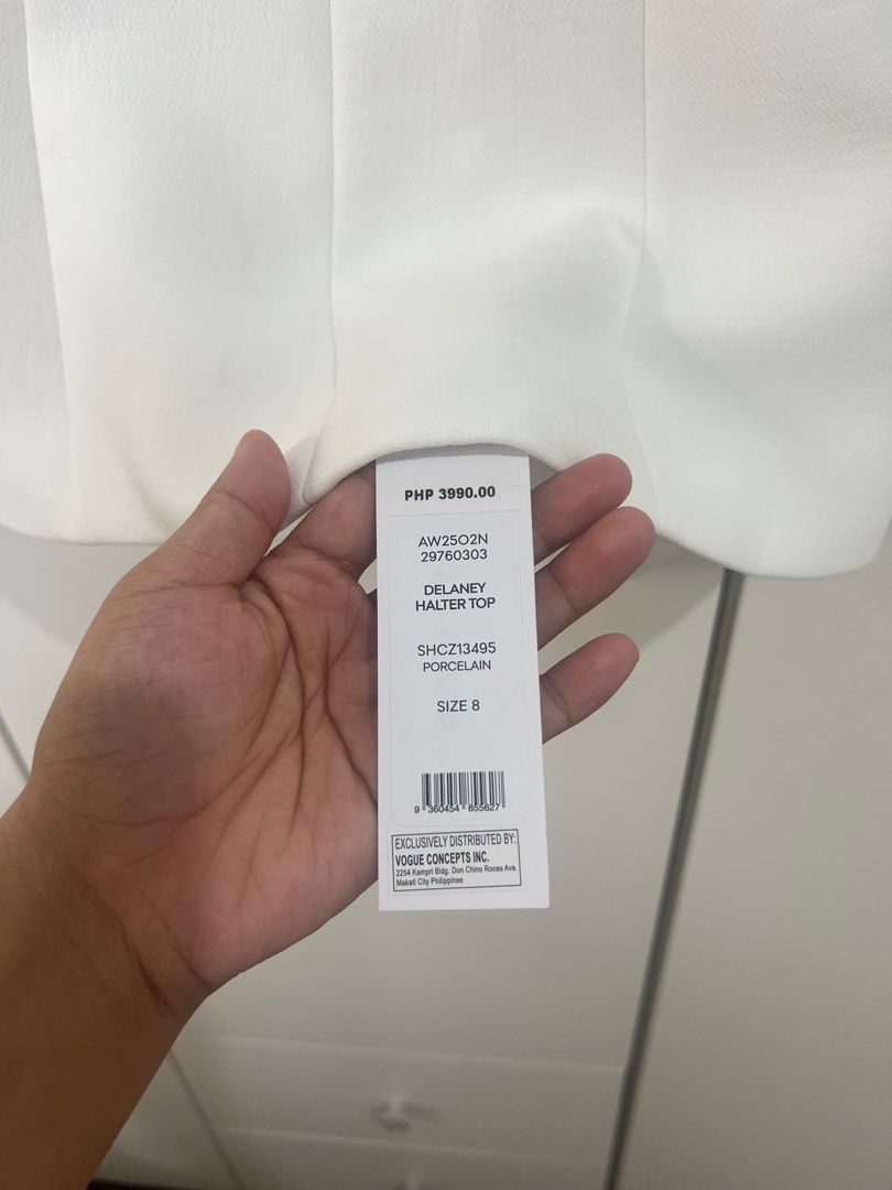 Ever new white top (Category: Sleeveless) located in Mandaluyong City. Submitted by miss_declutter321 (Listing ID 1394998670, Image 3). Description: Tried it only. Brand new.