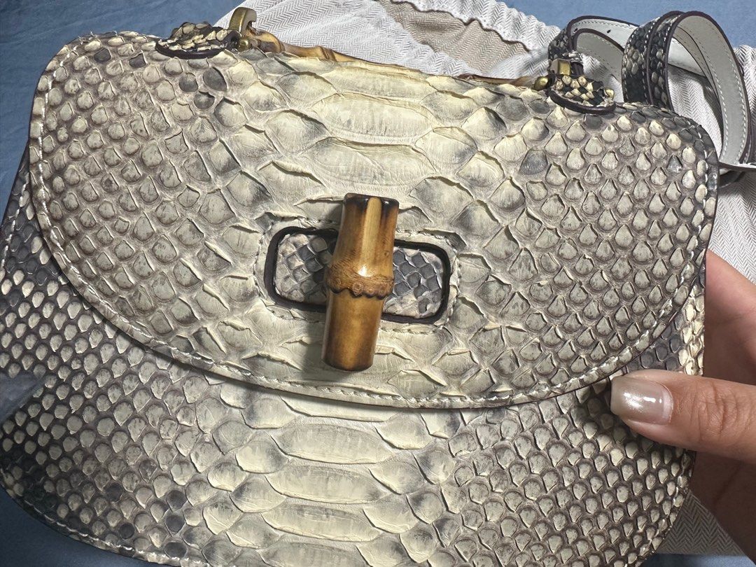 Handbag python leather bag (Category: Shoulder Bags) located in Singapore. Submitted by molan555 (Listing ID 1395117971, Image 3). Description: Original python leather bag, classic style, bamboo handle, cowhide lining.