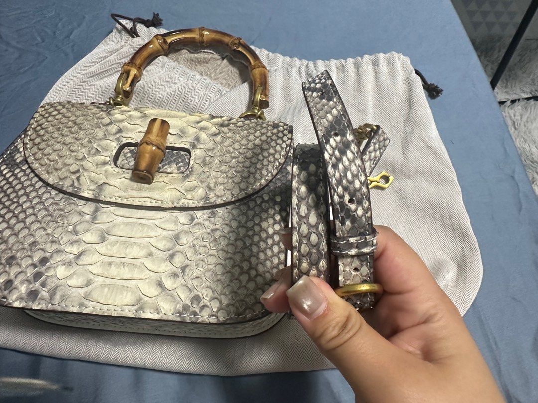 Handbag python leather bag (Category: Shoulder Bags) located in Singapore. Submitted by molan555 (Listing ID 1395117971, Image 2). Description: Original python leather bag, classic style, bamboo handle, cowhide lining.