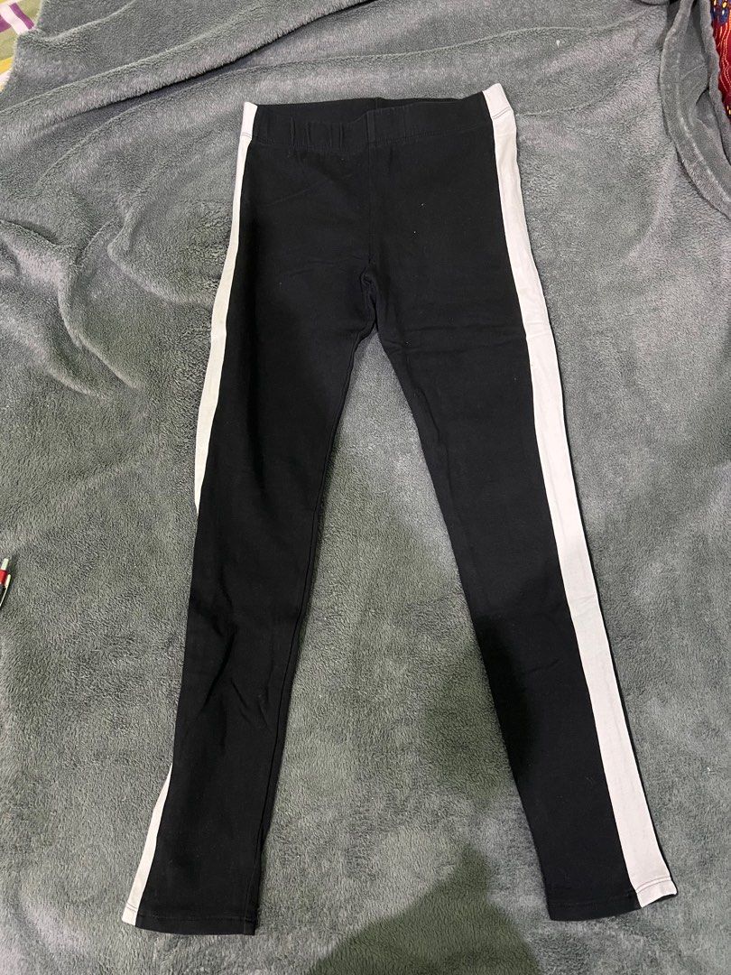 H&M Black Leggings with White Stripes (Category: Babies & Kids Fashion) located in Quezon City. Submitted by beafinds (Listing ID 1395125916, Image 3). Description: - H&M black leggings with white side stripes - Size: EUR 152 (fits 11-12 years old) - Material: 95% cotton, 5% elastane - Waist: Approximately 13 inches - Length: Approximately 33.5 inches - Condition: Good.