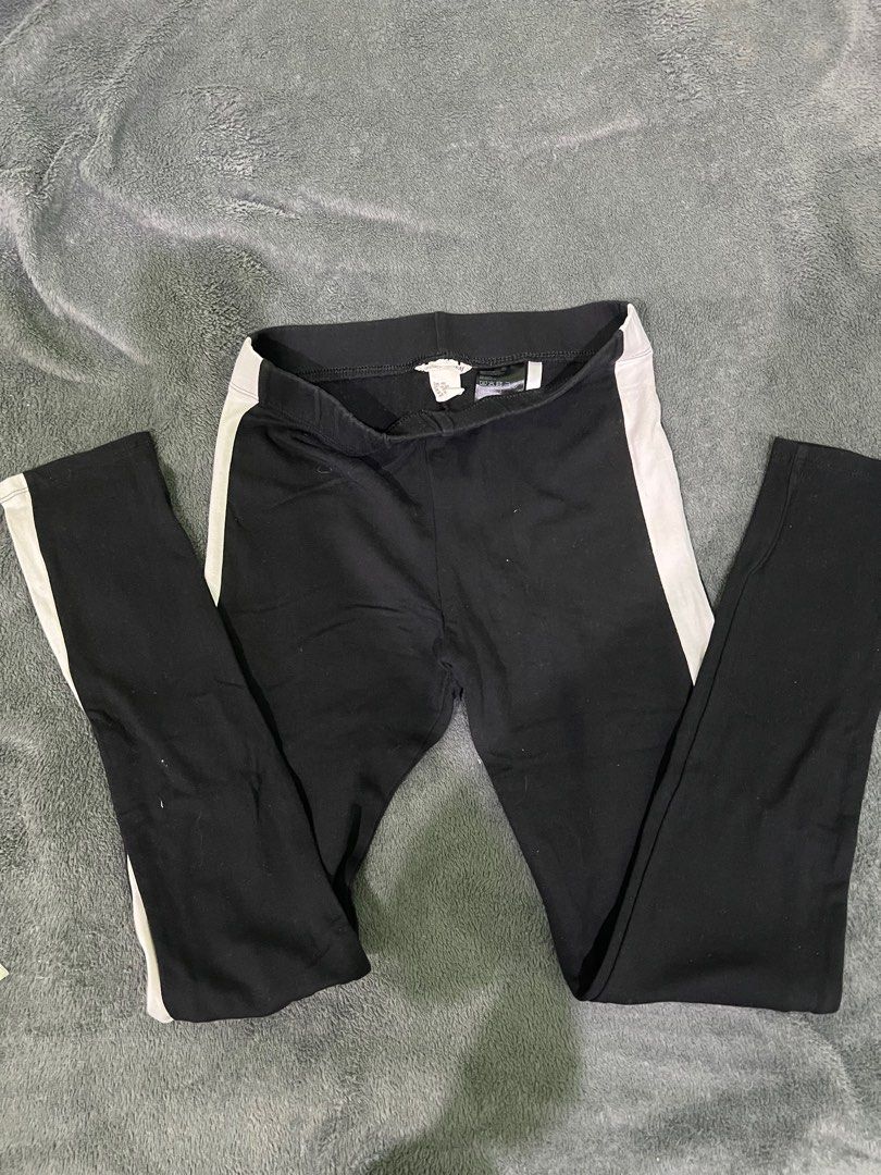 H&M Black Leggings with White Stripes (Category: Babies & Kids Fashion) located in Quezon City. Submitted by beafinds (Listing ID 1395125916, Image 1). Description: - H&M black leggings with white side stripes - Size: EUR 152 (fits 11-12 years old) - Material: 95% cotton, 5% elastane - Waist: Approximately 13 inches - Length: Approximately 33.5 inches - Condition: Good.