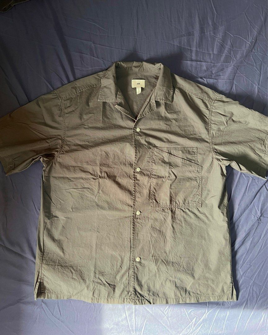 H&M Dark Grey Polo (Category: Tshirts & Polo Shirts ) located in Quezon City. Submitted by samdolor (Listing ID 1395045455, Image 1). Description: .