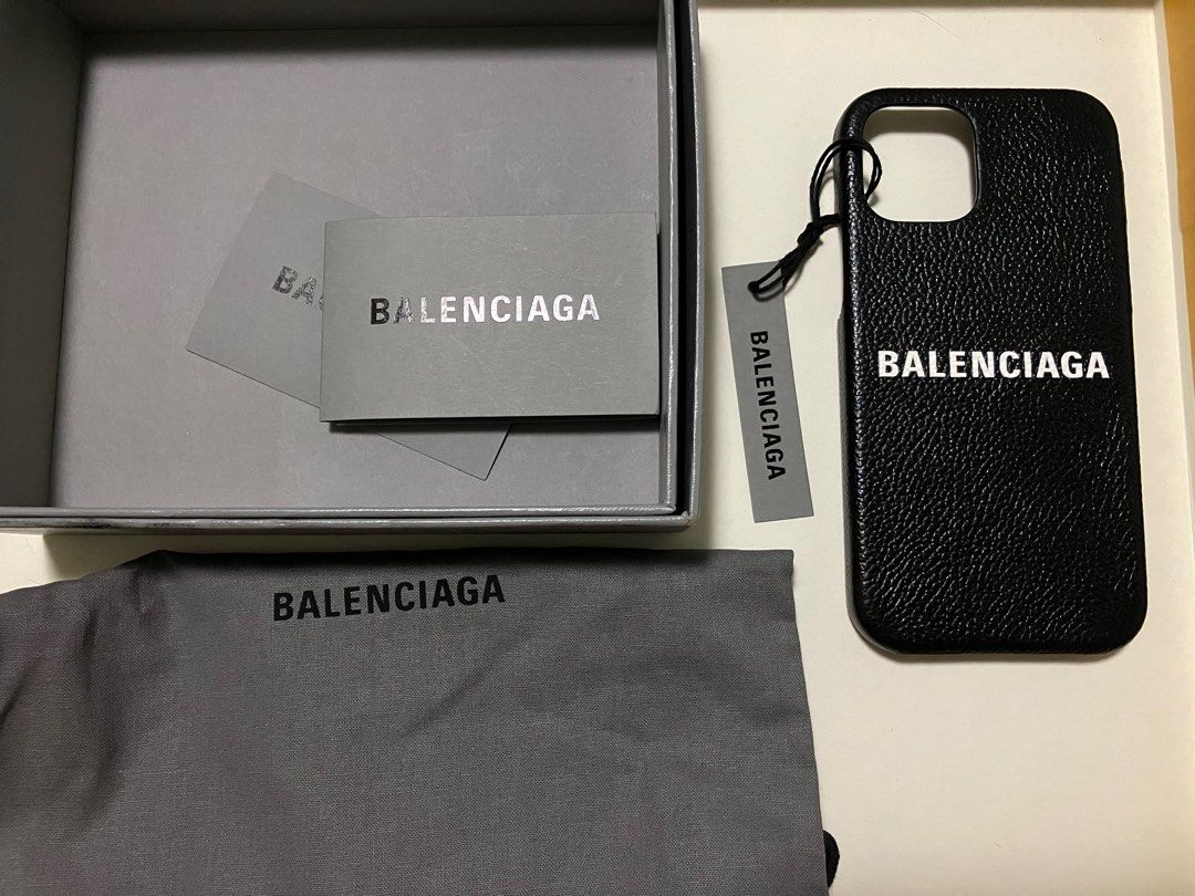 iPhone Case (Category: Cases & Sleeves) located in Singapore. Submitted by ahjibalang (Listing ID 1395129071, Image 3). Description: - Balenciaga iPhone case for 14, Might be able to fit 15 & 13 too. Free feel to try before purchase. - Includes original box, dust bag, and tags - Features Balenciaga logo - Excellent, unused condition.