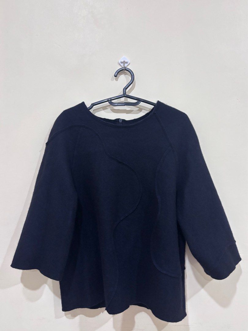 Korean brand Wool Top - XS-Small (Category: Longsleeves) located in Makati City. Submitted by solana36 (Listing ID 1395077086, Image 1). Description: Used once, korean brand No issue RFS: Decluttering Color: Dark Blue SF c/o buyer Location: East Rembo, Taguig.