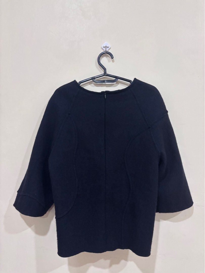 Korean brand Wool Top - XS-Small (Category: Longsleeves) located in Makati City. Submitted by solana36 (Listing ID 1395077086, Image 2). Description: Used once, korean brand No issue RFS: Decluttering Color: Dark Blue SF c/o buyer Location: East Rembo, Taguig.
