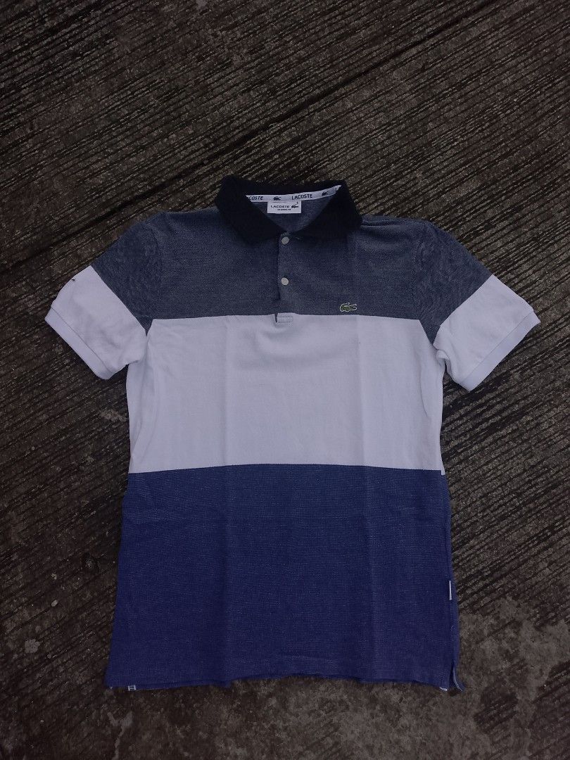 Lacoste Color Polo Shirt (Category: Tshirts & Polo Shirts ) located in Antipolo. Submitted by thriftingmob (Listing ID 1395064011, Image 1). Description: - Lacoste polo shirt(Classic fit) - Color blue, white, gray - Classic polo collar - Short sleeves with white cuffs - Small Lacoste logo on chest - Comfortable for casual wear -Bnew Condition.
