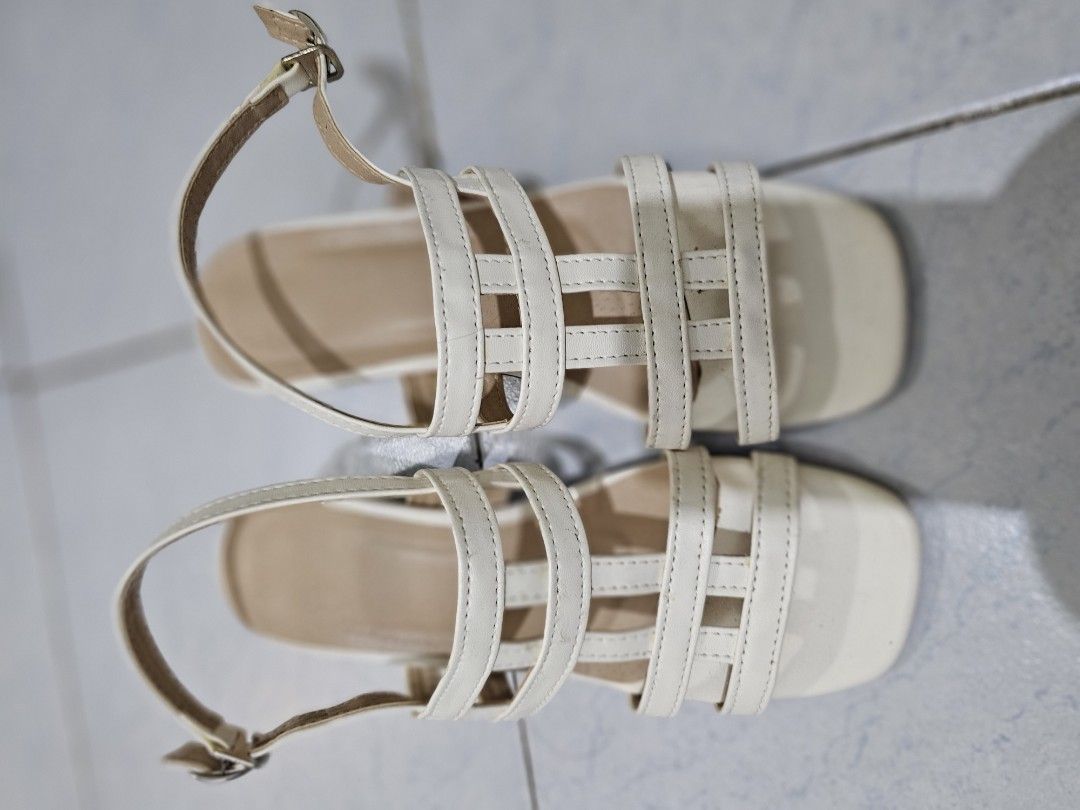 Liliw white strappy blocked heels (Category: Heels) located in Quezon City. Submitted by viperrr (Listing ID 1395093445, Image 1). Description: Used a couple of tines only. You can see the sole..