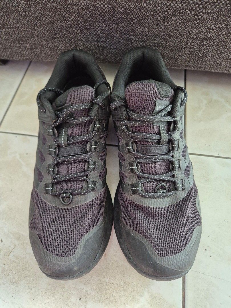 Merrell Shoes (Category: Sneakers) located in Quezon City. Submitted by project_guy (Listing ID 1394985948, Image 3). Description: - Merrell shoes - Dark grey color - Mesh upper - Lace-up closure - Merrell logo on insole.
