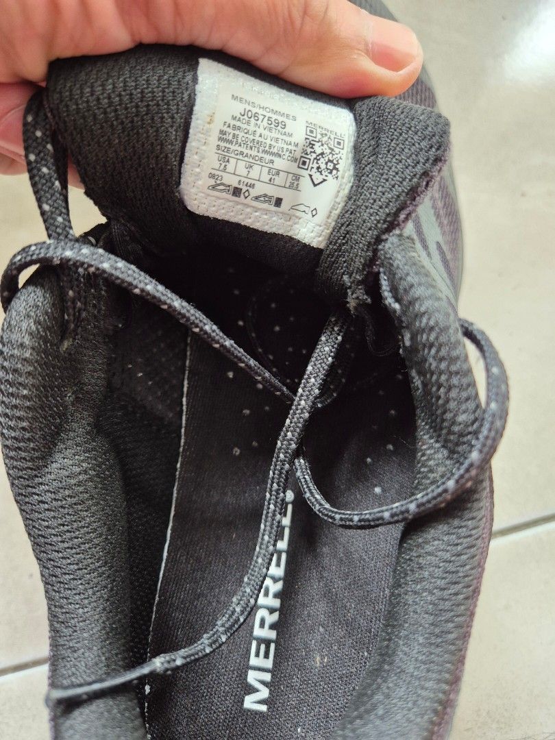 Merrell Shoes (Category: Sneakers) located in Quezon City. Submitted by project_guy (Listing ID 1394985948, Image 2). Description: - Merrell shoes - Dark grey color - Mesh upper - Lace-up closure - Merrell logo on insole.