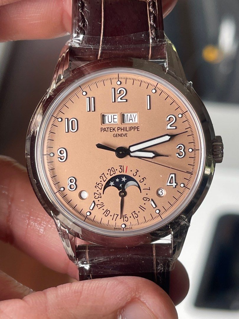 Patek Philippe 5320G-011 White Gold Watch (Category: Watches) located in Singapore. Submitted by gotitbystock (Listing ID 1395015061, Image 3). Description: New, never worn Patek Philippe 5320G-011, Salmon. With stickers attached Full set - Includes box, papers, and accessories. Local AD, may 2023.