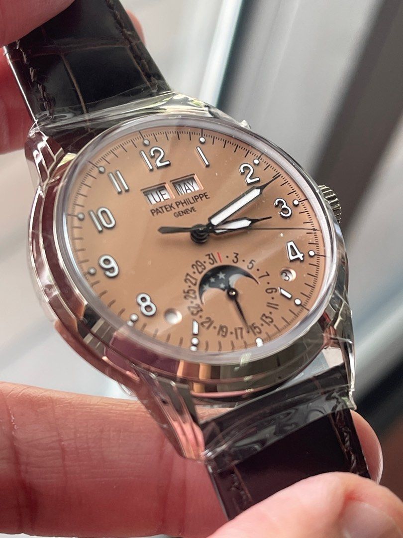 Patek Philippe 5320G-011 White Gold Watch (Category: Watches) located in Singapore. Submitted by gotitbystock (Listing ID 1395015061, Image 2). Description: New, never worn Patek Philippe 5320G-011, Salmon. With stickers attached Full set - Includes box, papers, and accessories. Local AD, may 2023.