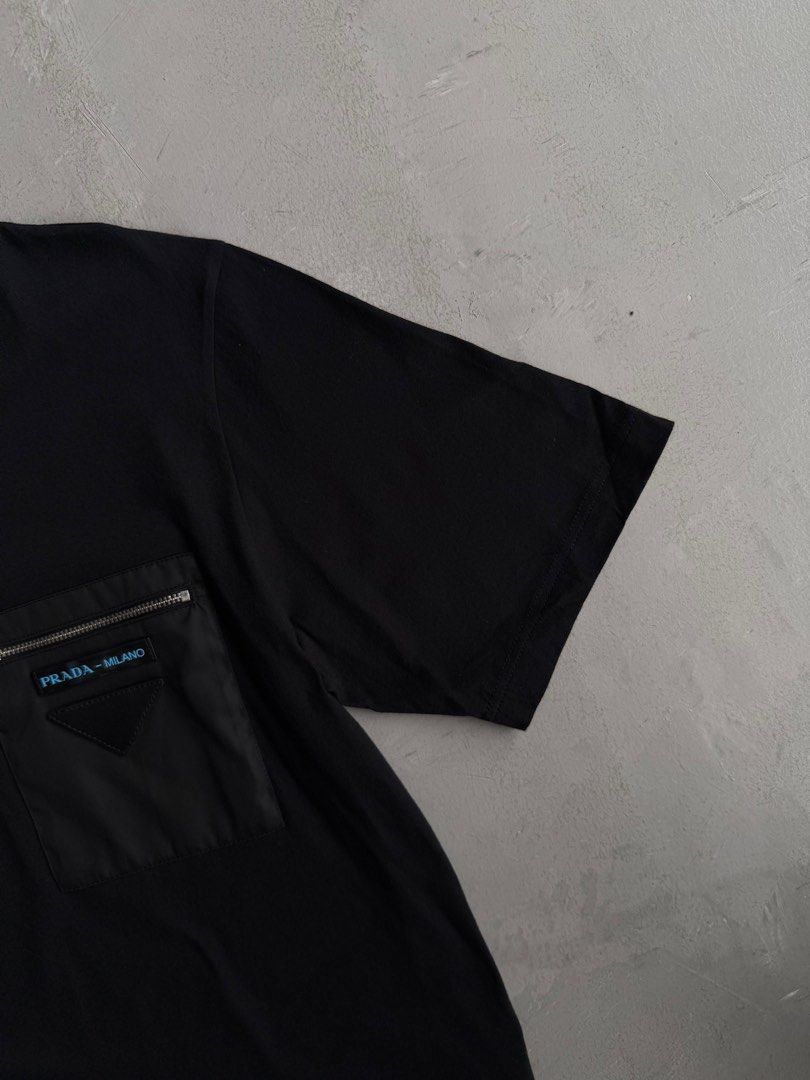 Prada Leather Patch Cotton T-Shirt (Category: Tshirts & Polo Shirts ) located in Santa Rosa. Submitted by beyondarchives (Listing ID 1395025490, Image 2). Description: Size: XS Width: 19 Length: 27 Materials: Cotton Condition: 9/10 Issue: None.