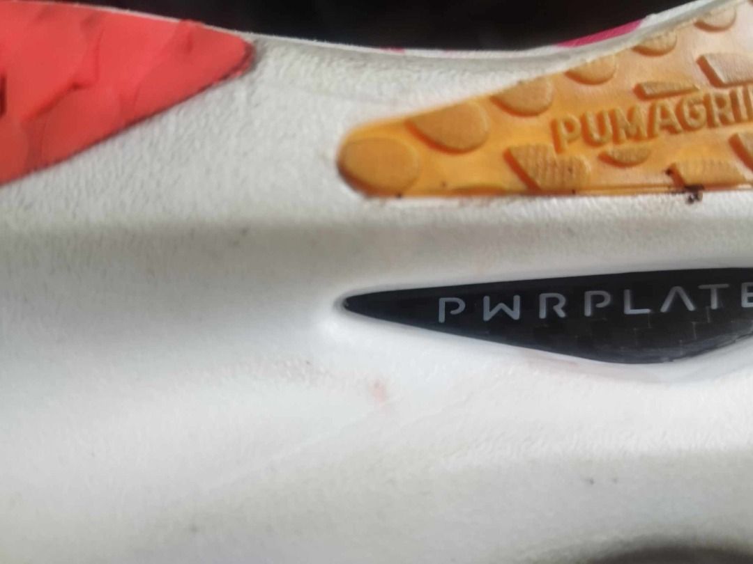 PUMA Nitro Deviate 2 ELITE (US Mens Size 12) (Category: Sneakers) located in Paranaque City. Submitted by shop.sports (Listing ID 1395076145, Image 2). Description: - PUMA Nitro Deviate 2 Elite (US Mens Size 12) - Color: Black - Midsole: White with NITRO branding and PWRPLATE technology - Outsole: PUMAGRIP for superior grip - Upper: Black with pink and orange accents - Sole details: Orange and red accents.