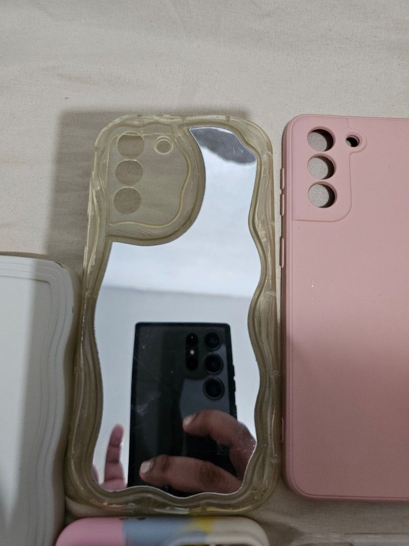 Samsung S21 5G Cases Bundle of 7 (Category: Cases & Sleeves) located in Makati City. Submitted by gracielle24 (Listing ID 1395143401, Image 3). Description: All Cases are used but bot abused. Lady Owned Bundle of 7 only Selling it due to phone upgrade.