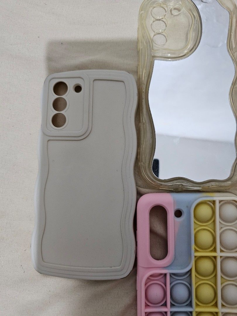 Samsung S21 5G Cases Bundle of 7 (Category: Cases & Sleeves) located in Makati City. Submitted by gracielle24 (Listing ID 1395143401, Image 2). Description: All Cases are used but bot abused. Lady Owned Bundle of 7 only Selling it due to phone upgrade.