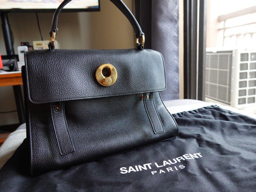 Saint Laurent Black Muse Leather 2-way Bag (Category: Luxury Bags & Wallets) located in Paranaque City. Submitted by jycy99 (Listing ID 1395074396, Image 1). Description: Item was bought in Japan. This comes with the original strap and dustbag RFS: Decluttering.