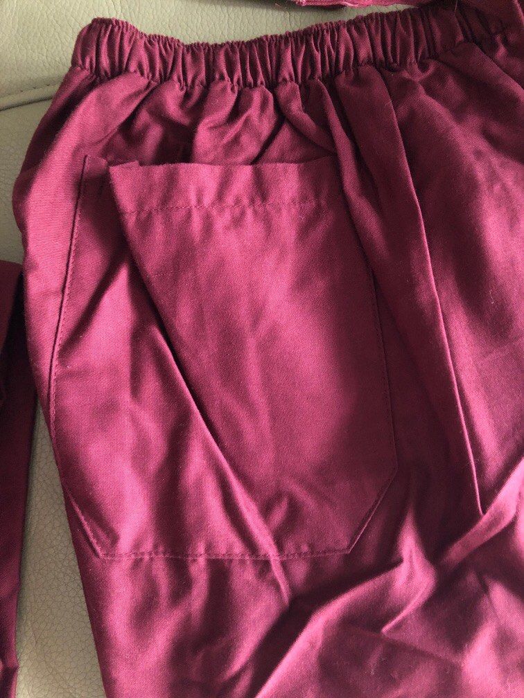 Scrubs (Category: Sets & Coordinates) located in Quezon City. Submitted by therosa (Listing ID 1395033875, Image 3). Description: Maroon color Back pocket Large Rfs: wrong color Never used. Available: 2 scrub pants ( no tops) 150 each.