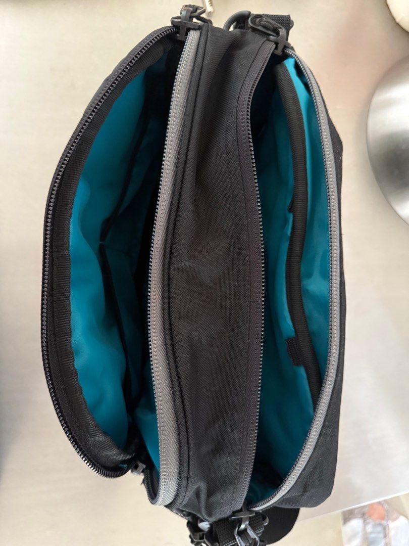 Shimano Fishing Shoulder Bag (Category: Shoulder Bags) located in Manila. Submitted by gentlewhale-d424 (Listing ID 1395037792, Image 3). Description: - Shimano shoulder bag - Multiple compartments - Vibrant blue interior - Padded shoulder strap for comfort - Mesh back panel for breathability - Small zippered pocket - Durable exterior - Shimano logo on strap and tag.