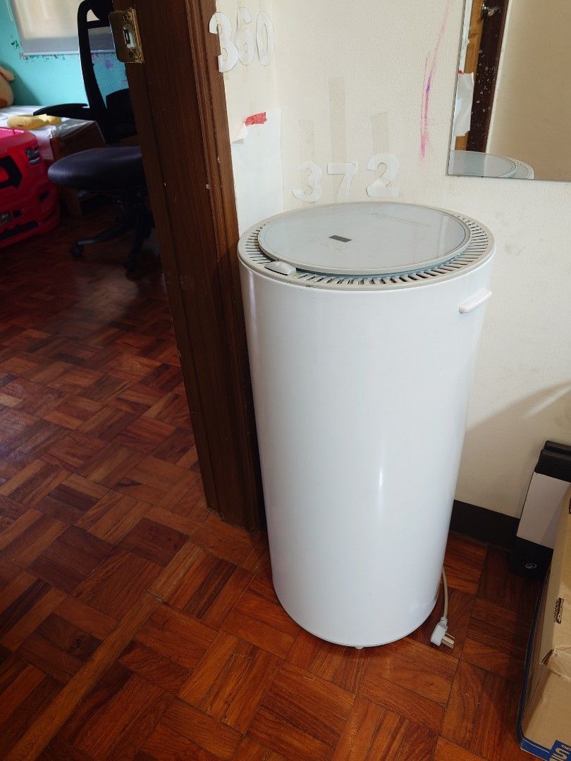 Smart Clothing Disinfection Dryer (Category: Washing Machines and Dryers) located in Manila. Submitted by chase168 (Listing ID 1395014428, Image 2). Description: - Smart clothing disinfection dryer - Sanitizes and dries clothes - Circular design - Control panel and door for loading - White, cylindrical shape - Brand name visible -UV function - Automatic -Good for baby clothes especially the UV function (up to 8 onesies) - 2-3 shirts in one go or 