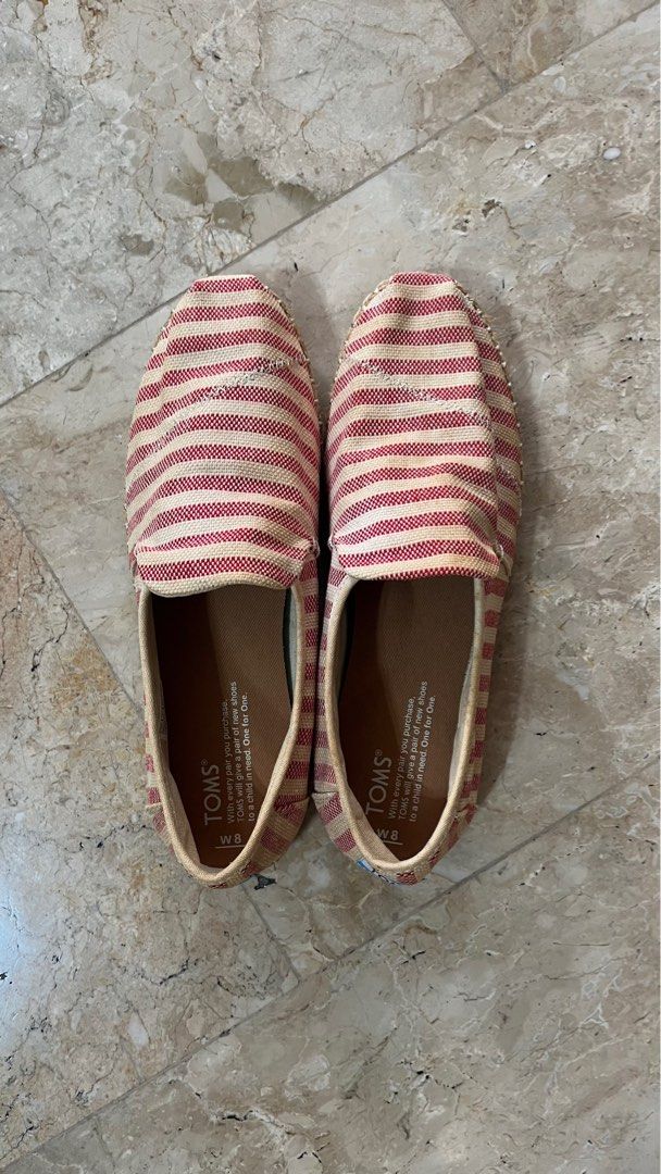 Toms red woven stripe espadrilles slip ons (Category: Loafers) located in Manila. Submitted by nmpc116 (Listing ID 1395016578, Image 1). Description: Barely worn Womens US SIZE 8 Deconstructed alpargata rope Red woven stripe Comes with box.