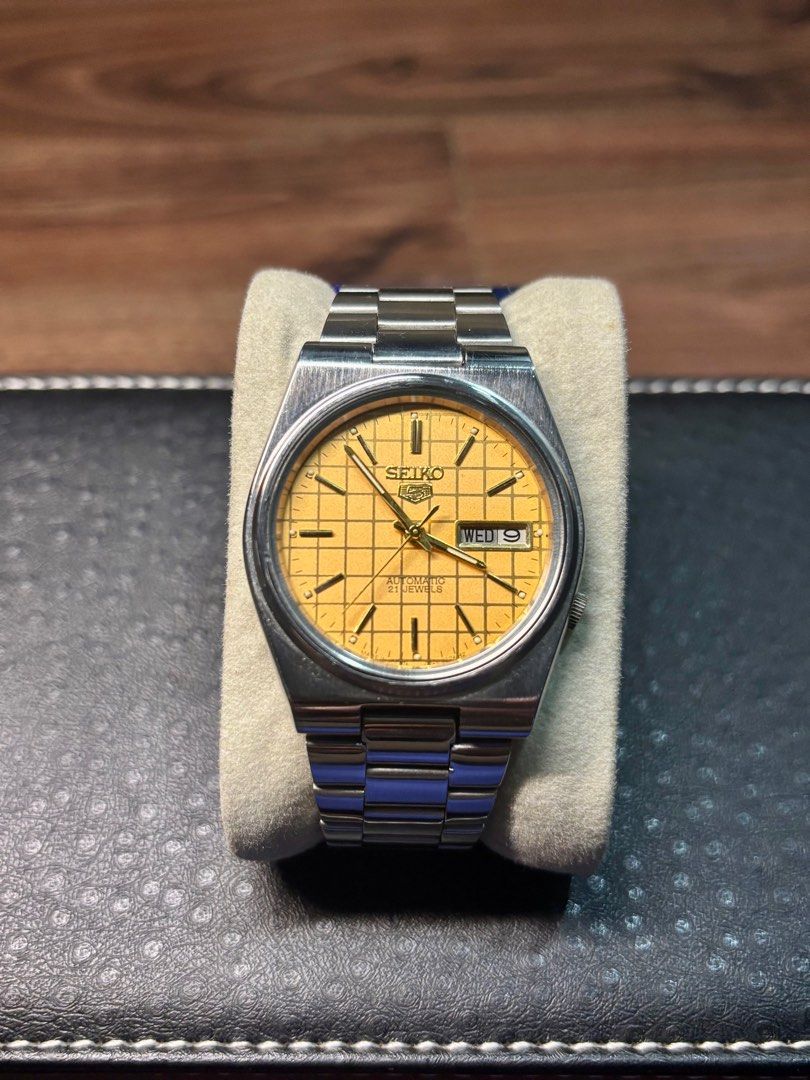 Vintage Seiko 5 Grid Dial Automatic Wrist Watch (Category: Men's Watches) located in Marikina City. Submitted by marceljdo (Listing ID 1379949389, Image 3). Description: Seiko 5 Golden Grid Dial Vintage Watch JDM Very Good Condition ++ English / Arab Day Date 7009 - 7S26 transition rare model 1980’s vibe! GCash. / BankTransfer / Lalamove .