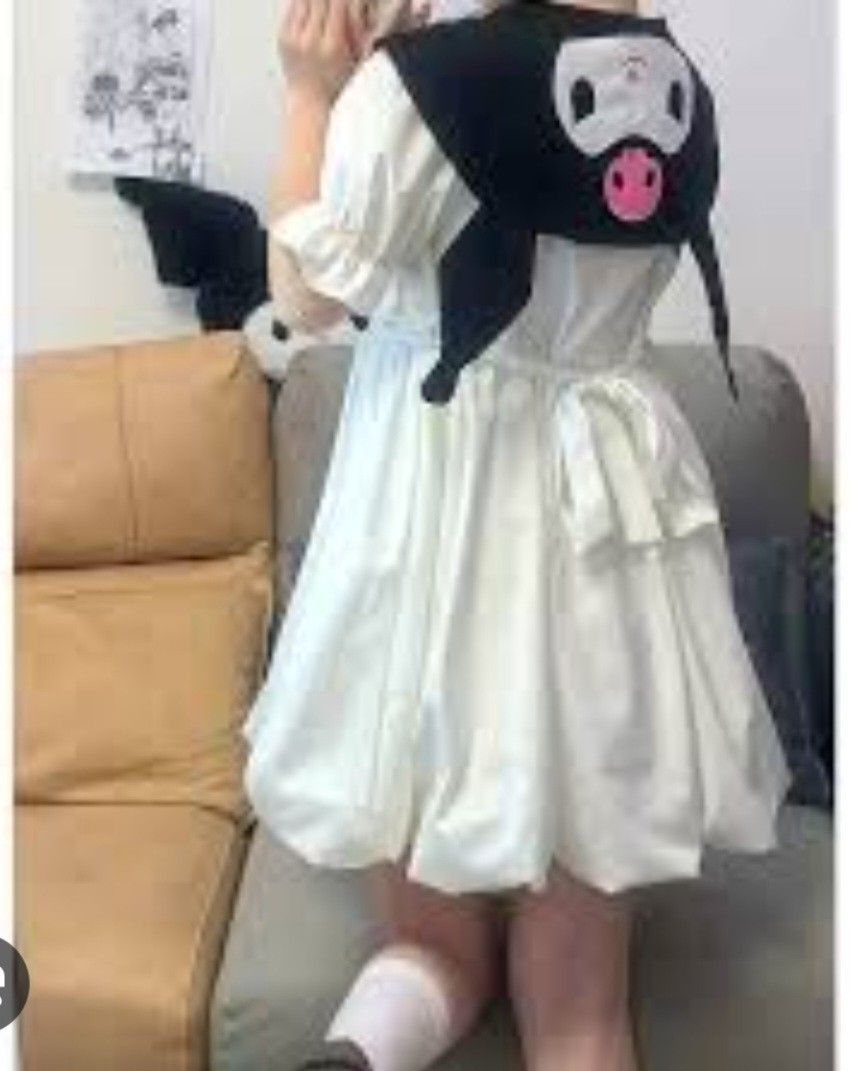 White Dress with Kuromi Shoulder Accessory (Category: Dresses) located in Mandaluyong City. Submitted by sochis_declutter (Listing ID 1395146236, Image 1). Description: - White dress - Short sleeves - Flared skirt - Bow at waist - Includes Kuromi shoulder accessory - Knee-length - Perfect for themed events or casual wear.