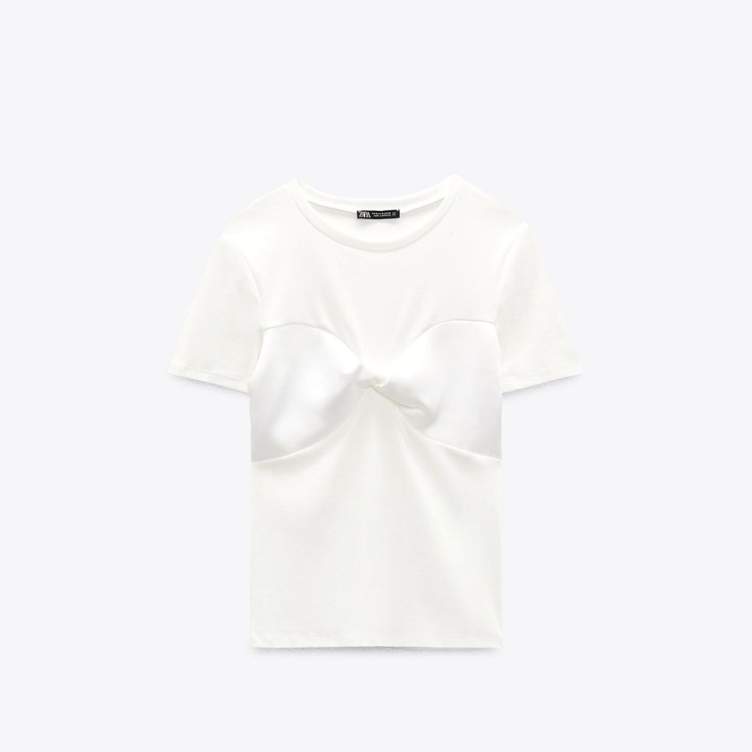 Zara White Bow Detail Top (Category: Sleeveless) located in Quezon City. Submitted by g.ysabel (Listing ID 1395106303, Image 1). Description: - Satin-like bow detail - Can be dressed up or down - Used twice only - Rfs: Not my style anymore :( .