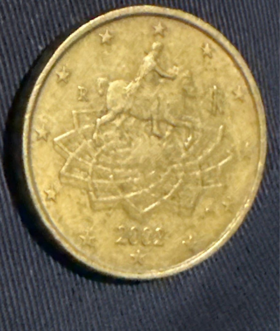 50 Euro Cent Coin 2002 (Category: Currency) located in Santiago. Submitted by iddu29 (Listing ID 1395339995, Image 2). Description: - 50 Euro Cent Coin - Year: 2002 - Design: Horse and rider - Material: Gold-colored metal.