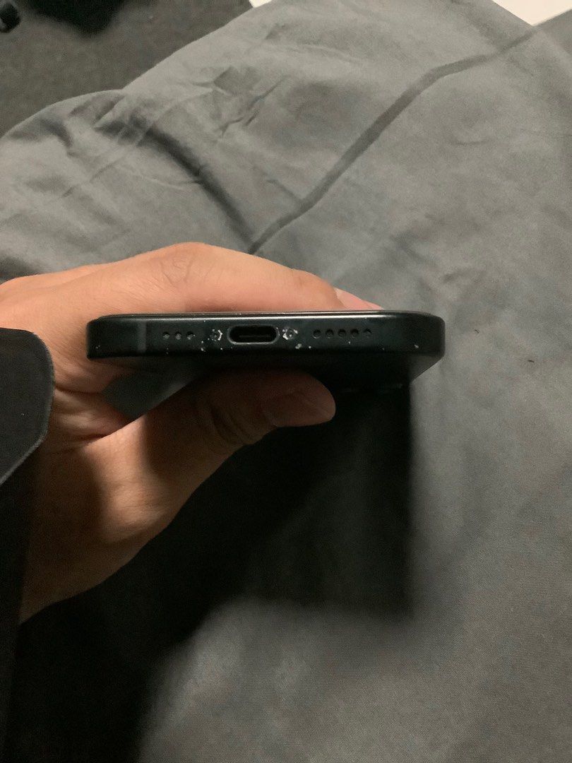 (Category: iPhone 15 Series) located in Singapore. Submitted by sally2016 (Listing ID 1395274364, Image 2). Description: - iPhone 13 in Black 256GB - Minor wear and tear near charging port - Screen is scratch-free - Comes with original box - Charger Head + Wire +$20 - First Owner, can share invoice - Slight Nego - FREE: Quadlock Case BNIB -RFS: spare phone.