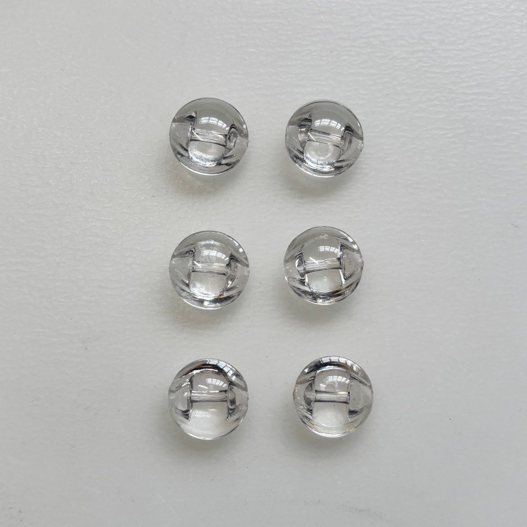 Assorted Button (new) (Category: Craft Supplies & Tools) located in Singapore. Submitted by jaco98 (Listing ID 1395200681, Image 2). Description: 1) 6x transparent (new) - 30 cents each Diameter 1.5cm 2) 2x green metal (new) - 20 cents each Diameter 1.3cm 3) 1x gold (new) - 50 cents Diameter 1.5cm 4) 1x pearl gold (new) - 50 cents Diameter 1.2cm.