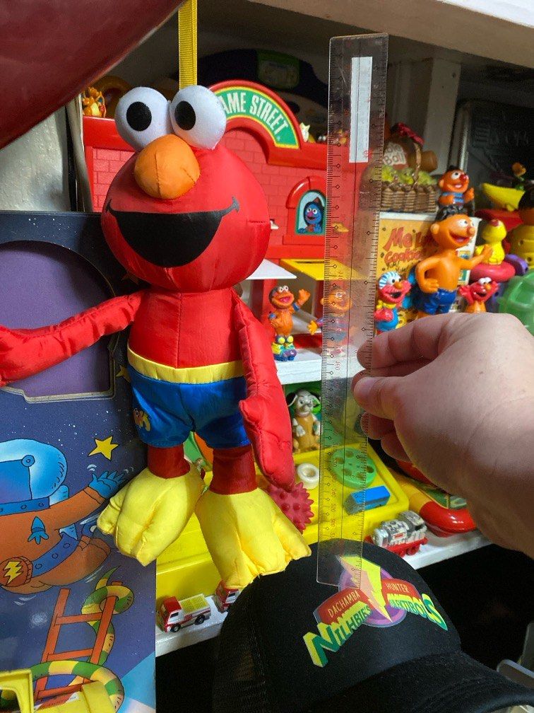 Bath time elmo (Category: Infant Playtime) located in Quezon City. Submitted by cpbautista (Listing ID 1395224702, Image 2). Description: For sale: Elmo bath time plush toy Around 11 inches tall QC area.
