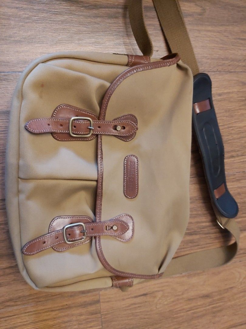 Billingham Camera Messenger Bag (Category: Luxury Bags & Wallets) located in Mandaluyong City. Submitted by j.alonso (Listing ID 1395220568, Image 1). Description: Billingham Hadley Camera Messenger Bag/Case Very good condition. No issues With Original Inner padded sleeve and Original Strap Cushion No issues.