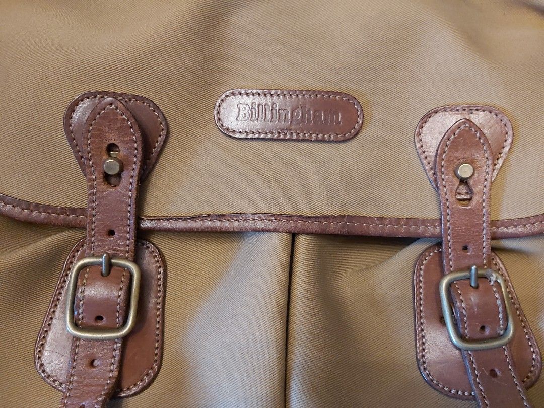 Billingham Camera Messenger Bag (Category: Luxury Bags & Wallets) located in Mandaluyong City. Submitted by j.alonso (Listing ID 1395220568, Image 3). Description: Billingham Hadley Camera Messenger Bag/Case Very good condition. No issues With Original Inner padded sleeve and Original Strap Cushion No issues.