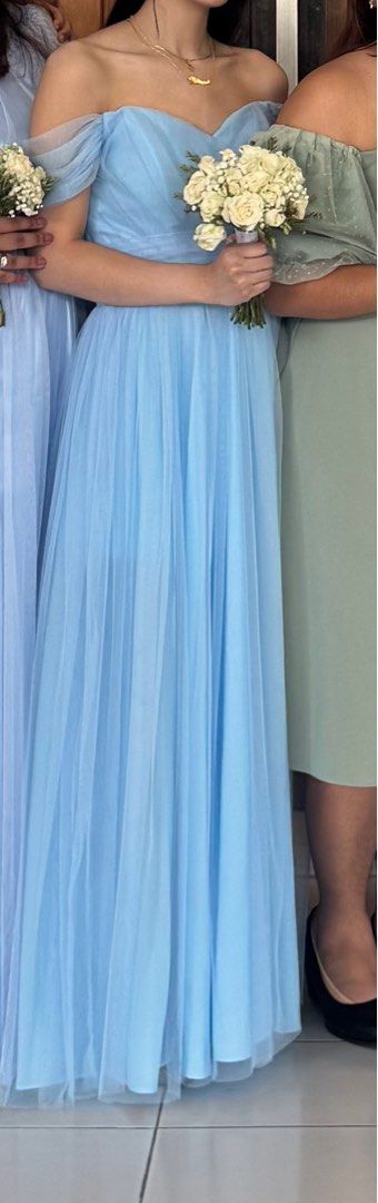 Bridesmaid Off-Shoulder Tulle Gown (Category: Evening dresses & gowns) located in Quezon City. Submitted by cupcak8 (Listing ID 1395162889, Image 3). Description: bust: 35 inches waist: 28 inches length: 54 inches weight: 50kg height: 5’5 • first photo same design but WITHOUT THE BEADS instead it comes with a fabric belt • belt can be tied, knotted, or looped to adjust the fit of the waist for more shape or comfort .