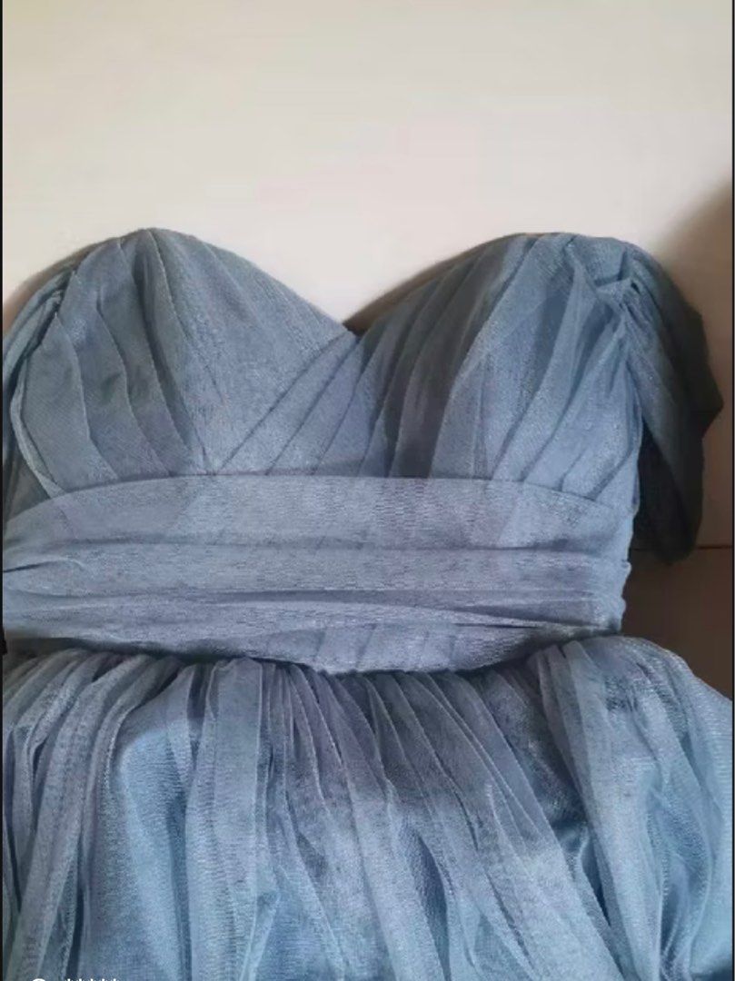 Bridesmaid Off-Shoulder Tulle Gown (Category: Evening dresses & gowns) located in Quezon City. Submitted by cupcak8 (Listing ID 1395162889, Image 2). Description: bust: 35 inches waist: 28 inches length: 54 inches weight: 50kg height: 5’5 • first photo same design but WITHOUT THE BEADS instead it comes with a fabric belt • belt can be tied, knotted, or looped to adjust the fit of the waist for more shape or comfort .
