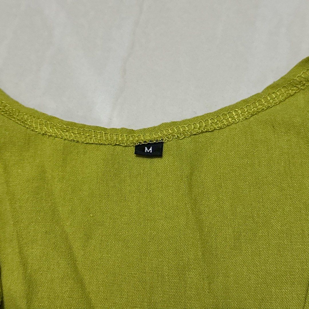 Calista Green Tie-Front Top - Size M (Category: Blouses) located in Manila. Submitted by modieus.ph (Listing ID 1395169929, Image 3). Description: - Green tie-front top - Size: M (but fits s) - Sleeveless - V-neck - Lightweight and comfortable fabric - Perfect for casual or night out.