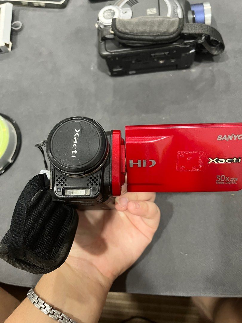 VIDEOCAMERA - SANYO XACTI (UNTESTED) (Category: Video Cameras) located in Paranaque City. Submitted by studiosecond (Listing ID 1395285038, Image 3). Description: UNTESTED Model: Sanyo Xacti Body Condition: 8/10 VIDEO: https://drive.google.com/drive/folders/1z2R-NQ7bCBR437Ftsd4adxNXGyDRoTmP RFS: I don’t have charger This is untested! I don’t know where to get the charger *Buy at your own risk* Items are non refundable .