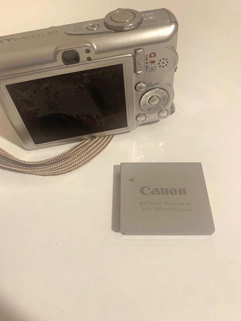 Canon Ixy L60 (Category: Cameras) located in Quezon City. Submitted by amarettosaurr (Listing ID 1395269508, Image 3). Description: i bought this camera back in 2023 at an instagram shop. therefore, it is a second hand camera. rfs: something wrong with the sd card reader (tried using 2GB and 4GB card but won’t detect - “memory not found”) other issue/s: - lcd burn (look at the last photo) - battery pack is inconsistent (sometimes it will say “cha