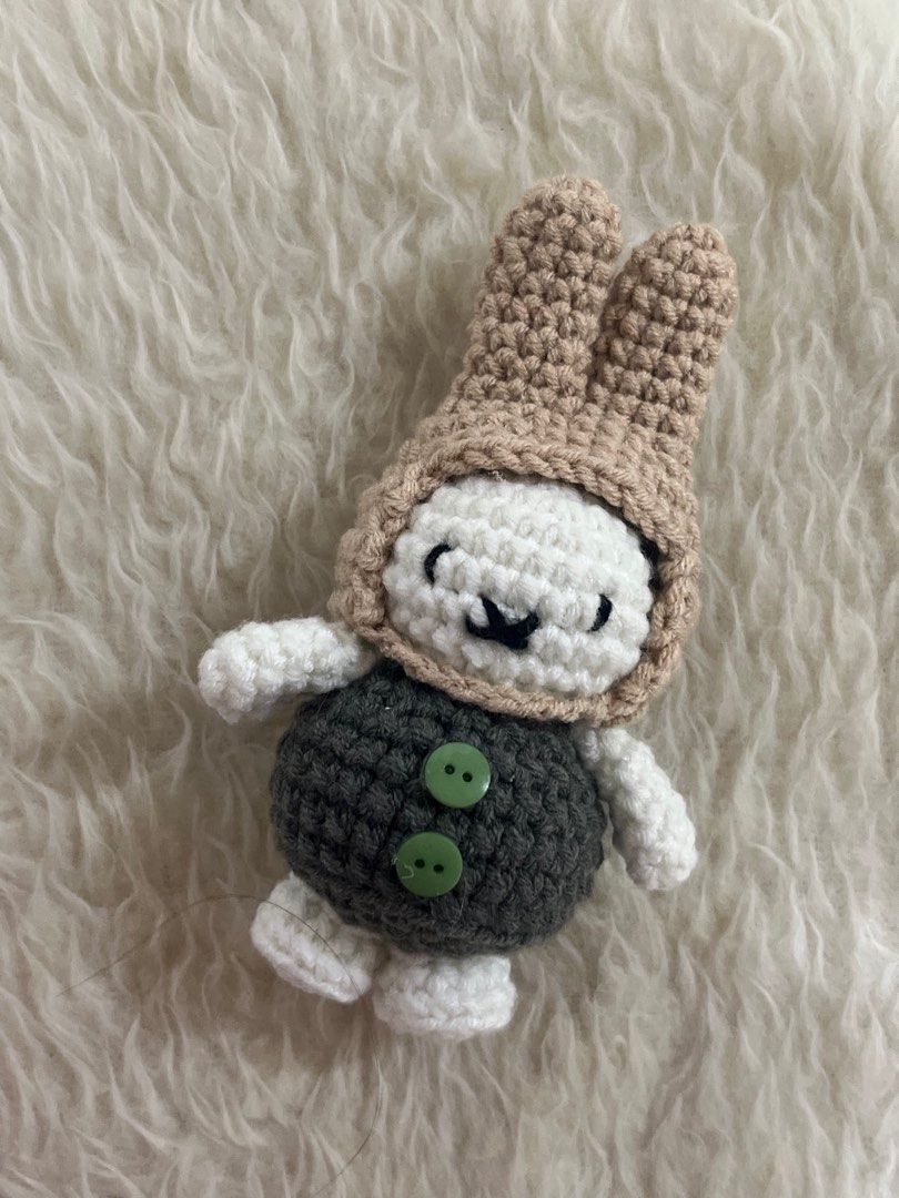 Crochet Green and Brown Miffy (Category: Handmade Craft) located in Dagupan City. Submitted by fully.stitched (Listing ID 1395254256, Image 1). Description: Handcrafted with love and precision, get your own Miffy now! This Miffy has a brown earmuff and a green body adorned with green buttons:) ᯓᡣ𐭩 Material: 5-ply yarn ᯓᡣ𐭩 Nationwide delivery available ᯓᡣ𐭩 Payment methods: GCash, bank transfer, COD (for meet ups), and more ᯓᡣ𐭩 Delivery method: