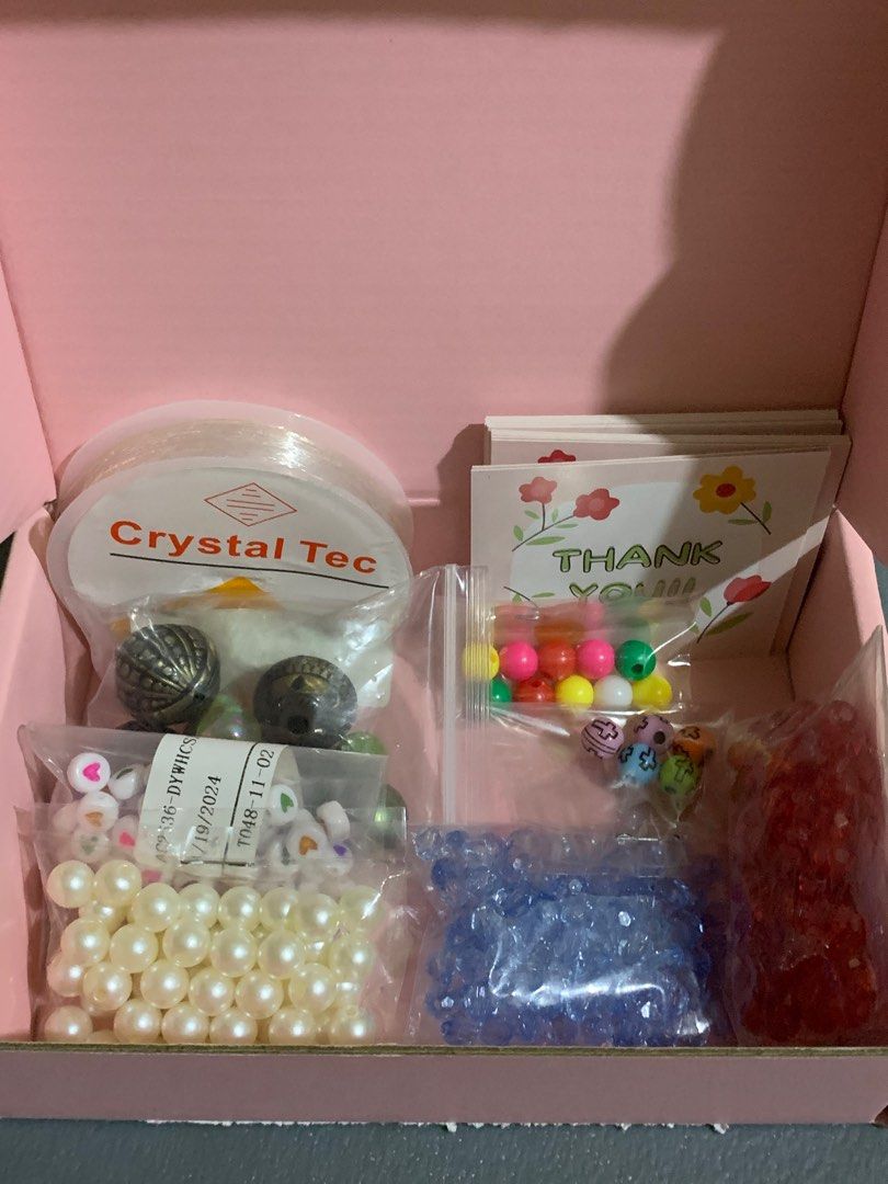 DIY Bead Kit with Assorted Beads (Category: Craft Supplies & Tools) located in Quezon, Nueva Vizcaya. Submitted by _shey.03 (Listing ID 1395321055, Image 1). Description: - DIY bead kit for jewelry making. - Includes: - Pearls - Colorful beads - Decorative beads - Crystal tec string - Thank you cards - Perfect for bracelets, necklaces, and other accessories. - Get creative and design your own unique pieces! FREEBIES: (they were all made by me!!) 
