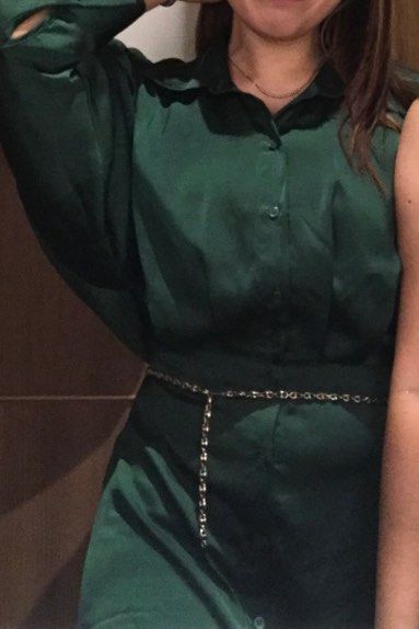 Emerald Green Dress (Category: Dresses) located in Imus. Submitted by cemoi (Listing ID 1395340560, Image 1). Description: - Emerald green dress - Collared neckline - Long sleeves - Silver chain belt included - Button-down front - Flattering silhouette - Perfect for formal events and special occasions - Stylish and versatile.