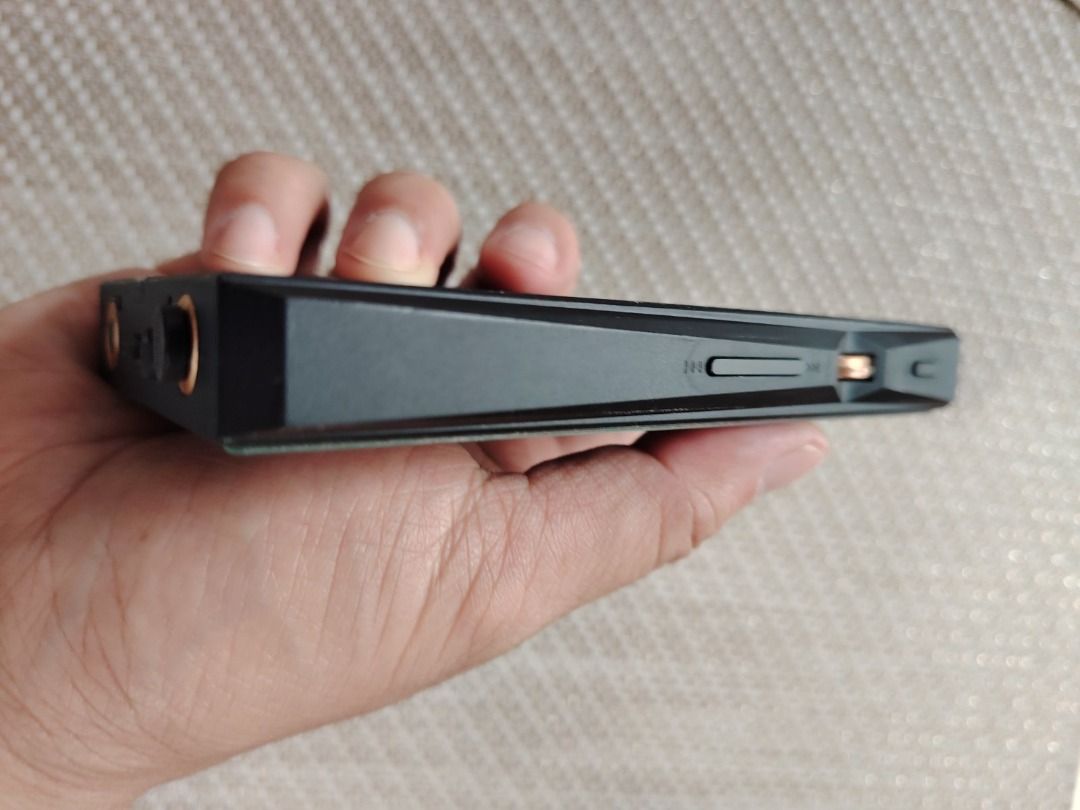FiiO M11 Digital Audio Player (Category: Portable Music Players) located in Manila. Submitted by goldfiz92516 (Listing ID 1395181959, Image 3). Description: - FiiO M11S Portable Music Player - 3.5mm Headphone Jack - USB-C Port - microSD Card Slot - Sleek Black Design - Reflective Glass Back Very good Working and Physical Condition No Scratches 100% Working (free courier delivery within Metro Manila).