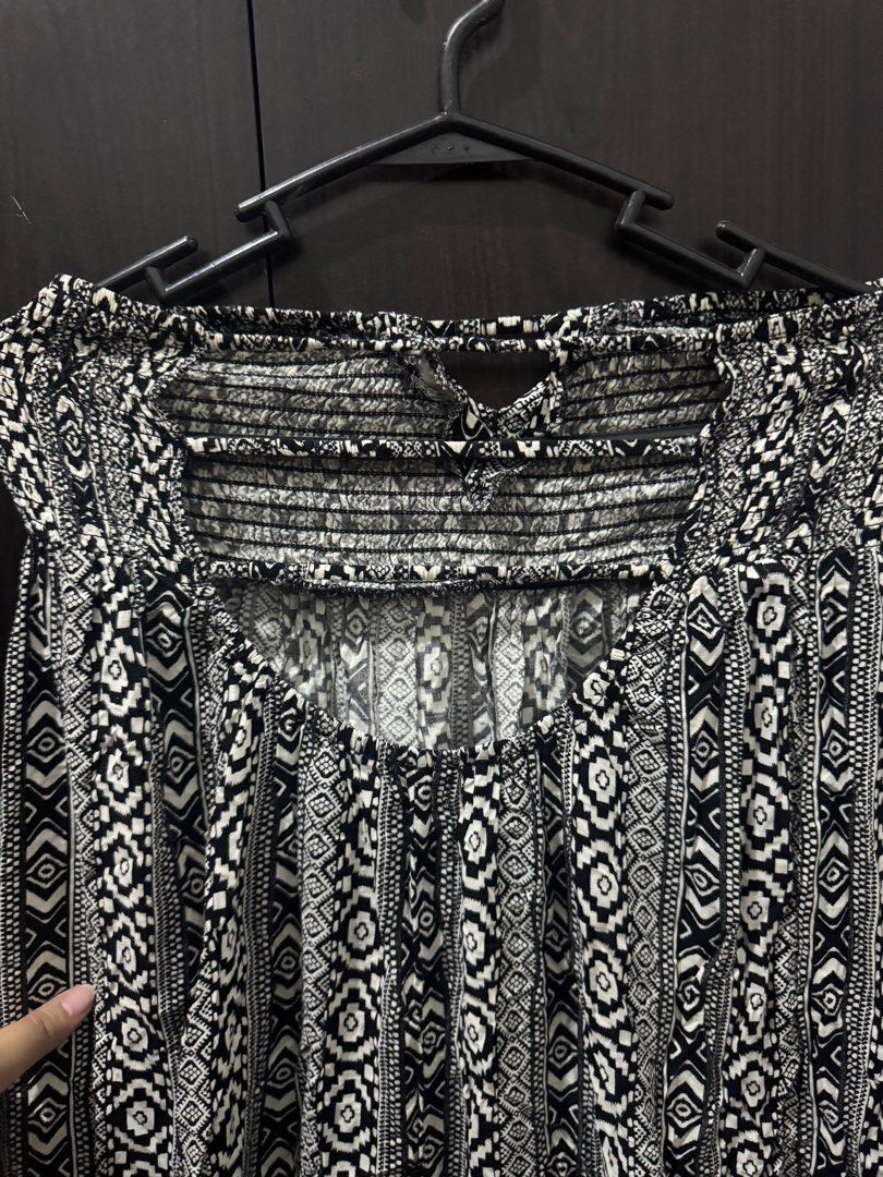(Get 3 for 350) Boho Maxi Dress S-L (Category: Dresses) located in Taguig. Submitted by bnplswmakeup (Listing ID 1395187225, Image 3). Description: - Black and white tribal print - Strapless design - Smocked bodice - Maxi length - Flowy and lightweight fabric - Ideal for casual outings and beach vacations -Unknown brand. MOP: BPI/Gcash Shipping via J&T/Grab/Lalamove.
