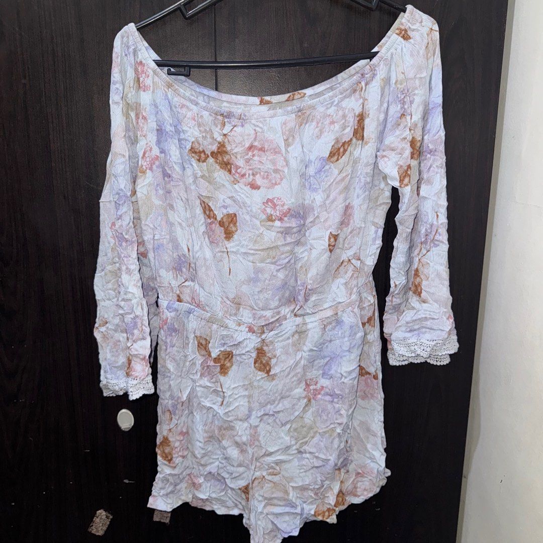 (Get 3 for 350) Mossimo Floral Romper S-L (Category: Rompers) located in Taguig. Submitted by bnplswmakeup (Listing ID 1395191124, Image 2). Description: - Mossimo romper - Floral print - Off-shoulder design - Three-quarter sleeves - Lace detailing on cuffs - Cinched waist - Size: S but can fit up to Large MOP: BPI/Gcash Shipping via J&T/Grab/Lalamove.